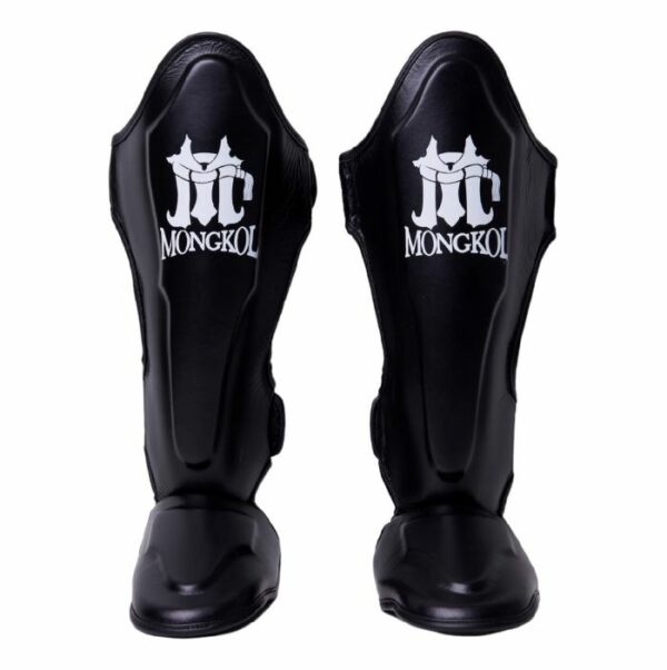 Protège-tibias Muaythai Mongkol - Offrez à vos tibias une protection optimale et un confort supérieur avec ces protège-tibias de haute qualité, parfaits pour des entraînements intensifs et des compétitions.