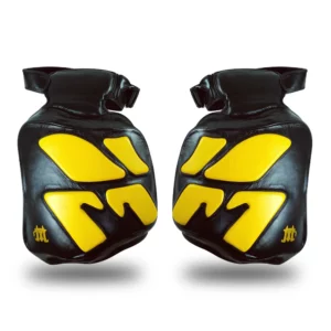 Protège-cuisses Mongkol en cuir véritable une protection robuste aux jambes idéaux pour l'entraînement des coups bas de manière réaliste pour les coachs du pieds poings muaythai kickboxing mma savate