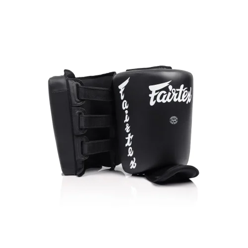Paire de protège-mollets Fairtex SP10 noirs en cuir microfibre avec sangle velcro réglable, pour Muaythai, MMA et kickboxing