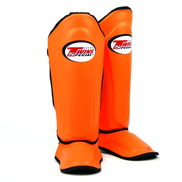 protège tibia twins orange Protège-tibias Twins Special SGL10 orange en cuir véritable pour muay thai, kickboxing et MMA