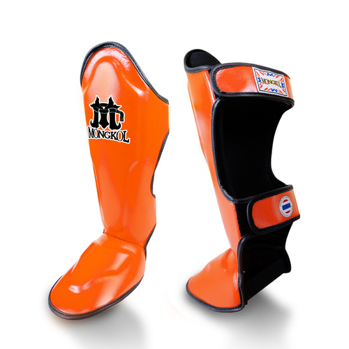 Protège tibia mongkol orange Protège-tibias Mongkol orange protection Muay Thaï