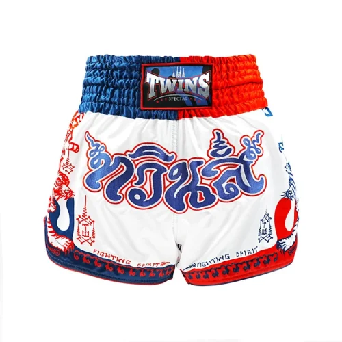 Short Muay Thaï Twins Sak Yant vue de face avec inscription thaïlandaise et motif tigre